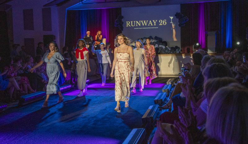 Models fill the catwalk for the finale of Runway 2026.